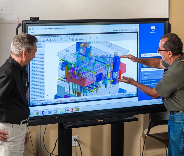 Seaway engineers designing a large, detailed mold for an Aerospace company